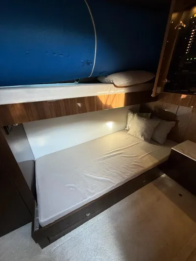 Emilia Yacht Photos Pics Interior cabin of 2022 Cruisers Yachts 54 Cantius with bunk beds.
