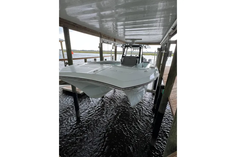  Yacht Photos Pics 2025 Front Runner 37 Catamaran docked in a covered marina.