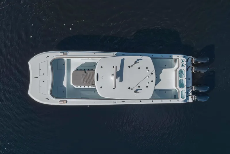  Yacht Photos Pics Aerial view of 2025 Front Runner 37 Catamaran on dark water.