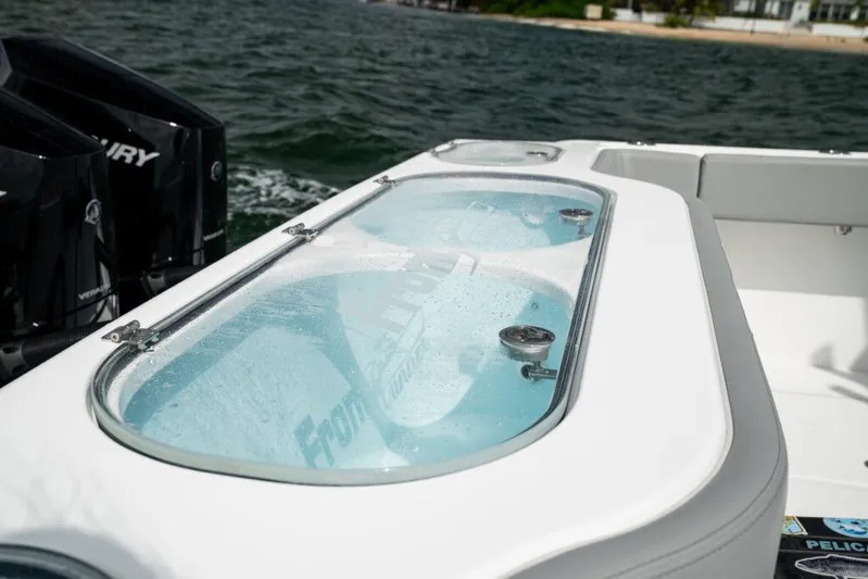  Yacht Photos Pics 2025 Front Runner 37 Catamaran with dual Mercury engines on the water.