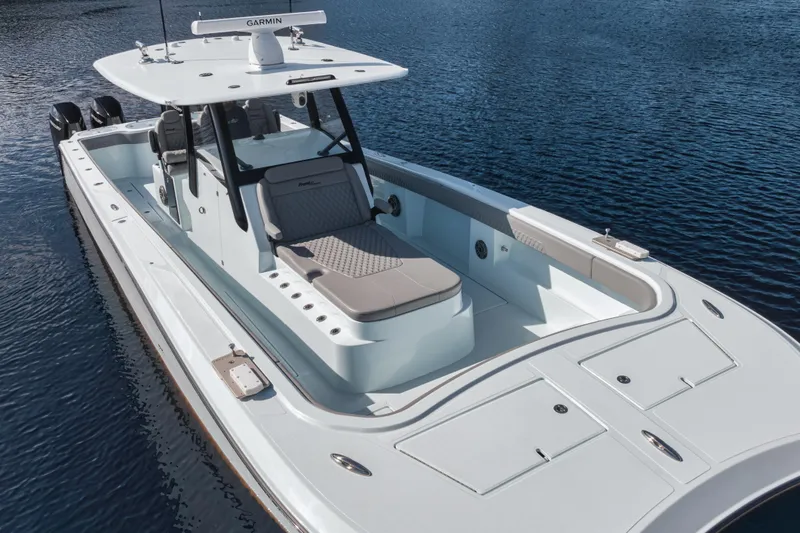  Yacht Photos Pics 2025 Front Runner 37 Catamaran on water, showcasing sleek design and spacious deck.