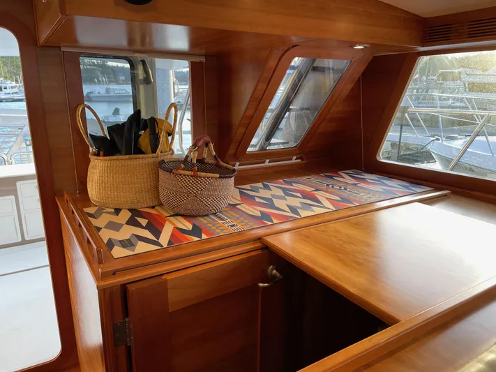  Yacht Photos Pics Luxurious 2012 Coastal Craft 56 yacht interior with wooden finish and decorative baskets.