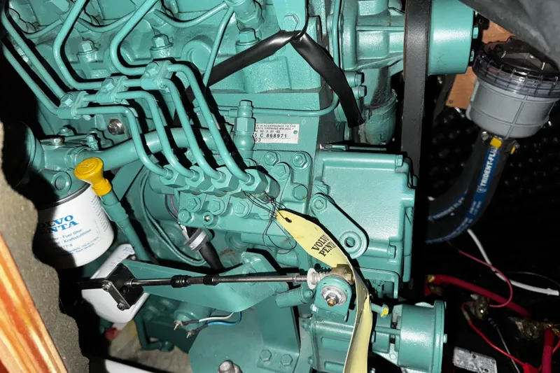 Still In The Moment Yacht Photos Pics Engine compartment of a 2007 Beneteau 423 sailboat with Volvo Penta components.
