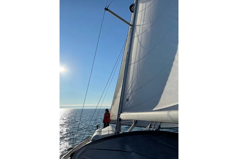 Still In The Moment Yacht Photos Pics Sailing on a 2007 Beneteau 423 yacht under clear blue skies.