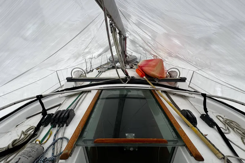 Still In The Moment Yacht Photos Pics Sailing deck of 2007 Beneteau 423 yacht with rigging and equipment under sail.