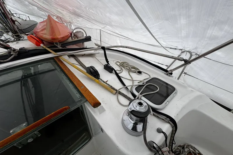 Still In The Moment Yacht Photos Pics Deck of 2007 Beneteau 423 sailboat with ropes and equipment.