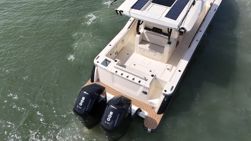  Yacht Photos Pics 2024 Scout 377 LXF boat with dual engines on water.