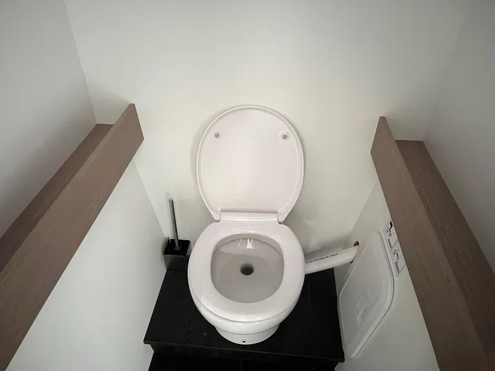  Yacht Photos Pics Toilet in 2022 Fountaine Pajot Elba 45 yacht, featuring modern design and compact space.