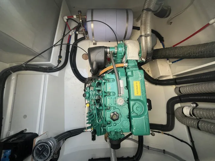  Yacht Photos Pics Engine compartment of 2022 Fountaine Pajot Elba 45 catamaran, showcasing mechanical components and wiring.