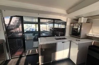  Yacht Photos Pics Modern kitchen interior of 2022 Fountaine Pajot Elba 45 catamaran.
