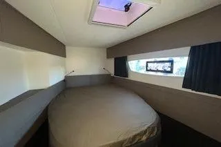  Yacht Photos Pics 2022 Fountaine Pajot Elba 45 cabin interior with bed, window, and skylight.