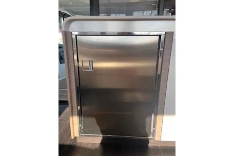  Yacht Photos Pics Stainless steel cabinet on 2022 Fountaine Pajot Elba 45 yacht interior.