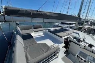  Yacht Photos Pics 2022 Fountaine Pajot Elba 45 catamaran with spacious deck and seating area.