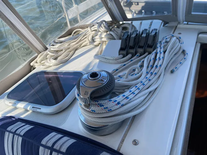  Yacht Photos Pics Sailing equipment on a 2001 Catalina 42 MkII yacht, featuring ropes and winch.