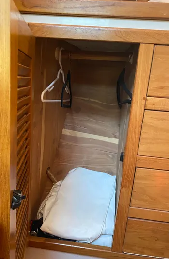  Yacht Photos Pics Wooden closet interior on a 2001 Catalina 42 MkII sailboat.
