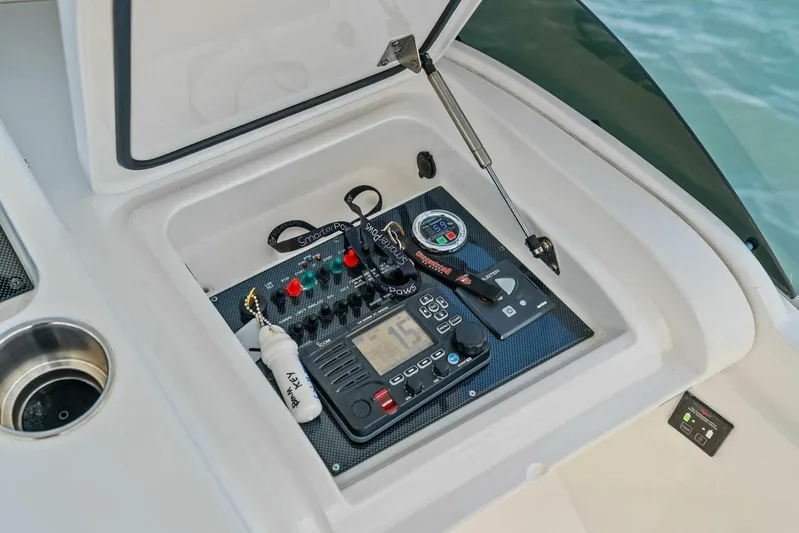 Still Dancing Yacht Photos Pics Control panel of a 2017 Bertram 35 Flybridge boat with navigation equipment.
