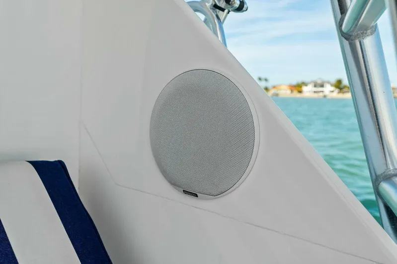 Still Dancing Yacht Photos Pics Speaker on 2017 Bertram 35 Flybridge yacht with ocean view in background.