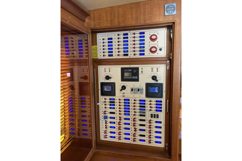Grace Yacht Photos Pics Electrical control panel on a 2019 Marlow 49E yacht, featuring switches and displays.