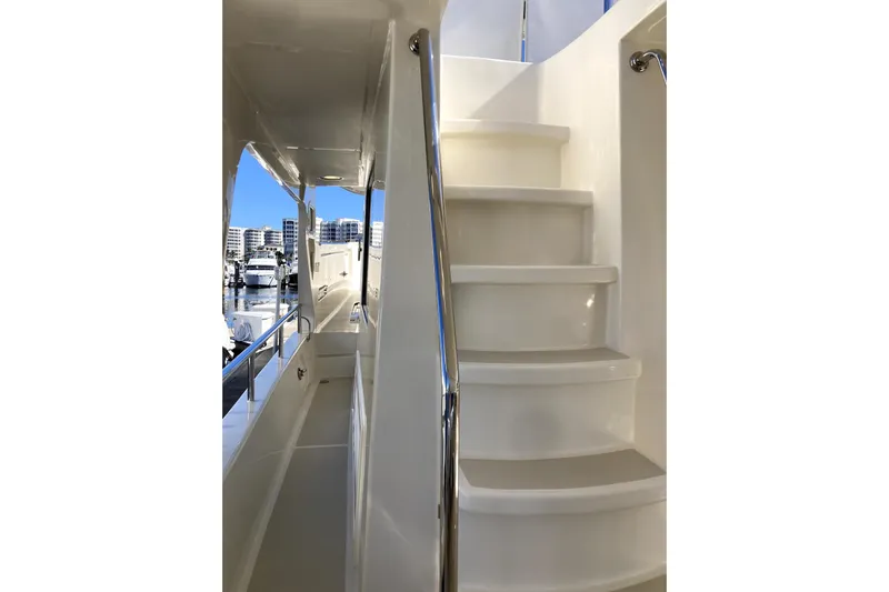 Grace Yacht Photos Pics Staircase on 2019 Marlow 49E yacht with marina view.