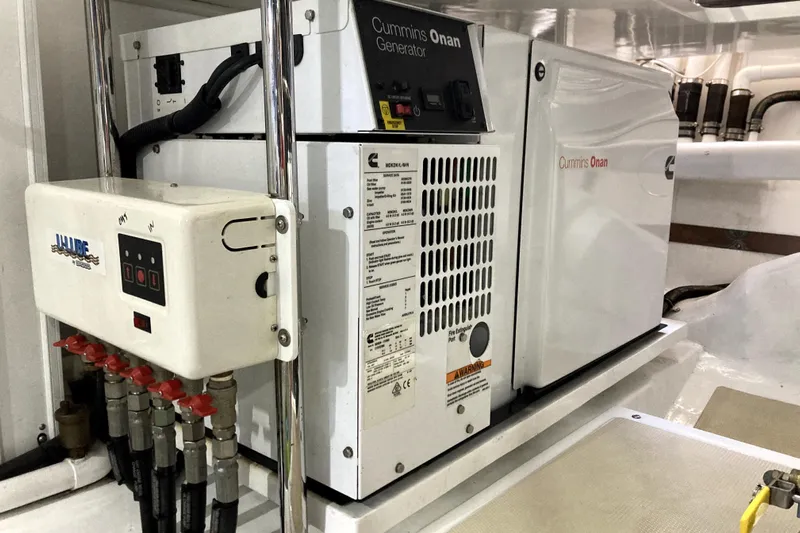 Grace Yacht Photos Pics Cummins Onan generator in 2019 Marlow 49E yacht engine room.