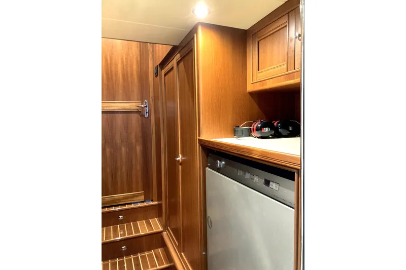 Grace Yacht Photos Pics Luxurious wooden interior of 2019 Marlow 49E yacht with modern appliances.