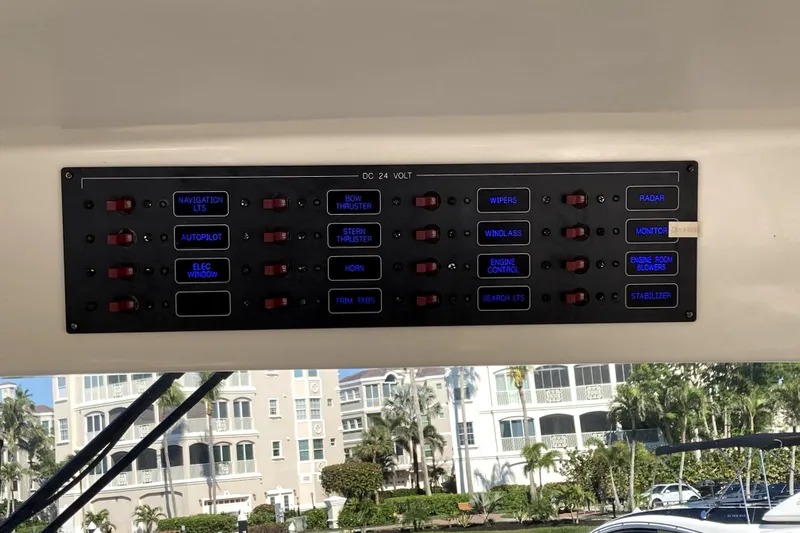 Grace Yacht Photos Pics Control panel of a 2019 Marlow 49E yacht with various labeled switches.