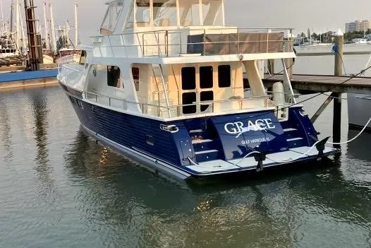 Grace Yacht Photos Pics 2019 Marlow 49E yacht "Grace" docked in a marina, rear view.