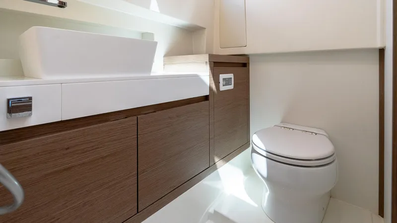  Yacht Photos Pics Modern bathroom interior on 2023 Pardo Yachts P38, featuring sleek sink and toilet design.