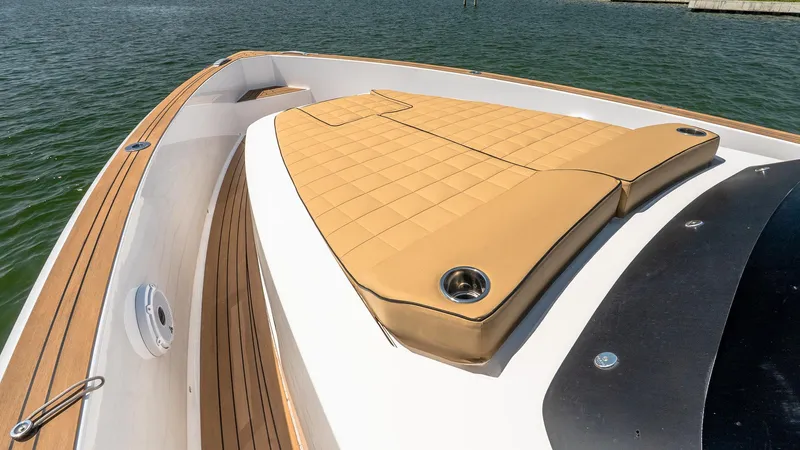  Yacht Photos Pics 2023 Pardo Yachts P38 deck with tan sunbed and teak flooring on water.