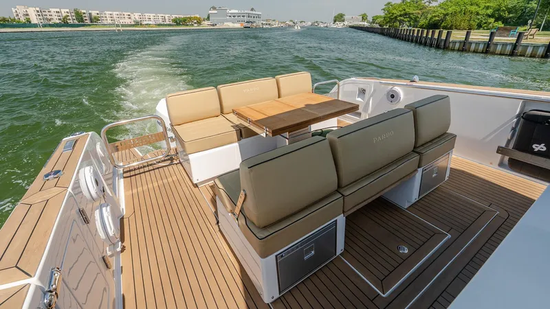  Yacht Photos Pics 2023 Pardo Yachts P38 deck with seating and table, cruising on a sunny day.