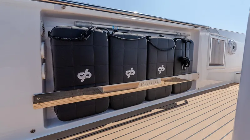  Yacht Photos Pics 2023 Pardo Yachts P38 deck with black fenders and teak flooring.