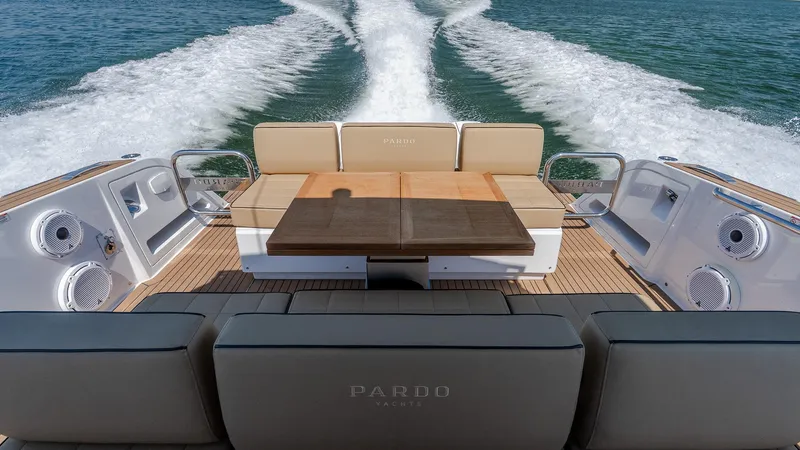  Yacht Photos Pics 2023 Pardo Yachts P38 luxury yacht cruising on open water, featuring elegant seating and teak deck.