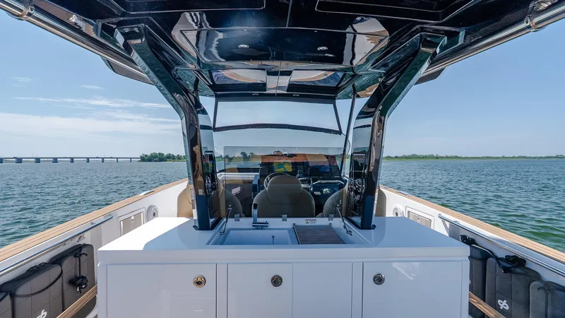  Yacht Photos Pics 2023 Pardo Yachts P38 cruising on open water, showcasing sleek design and modern features.