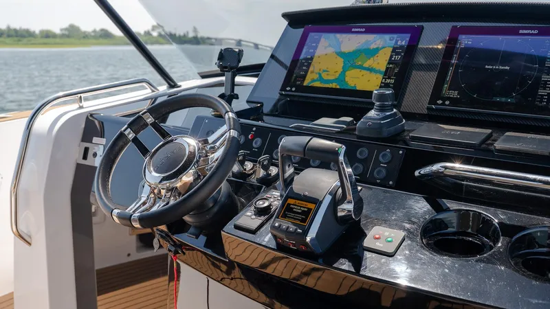  Yacht Photos Pics Helm of 2023 Pardo Yachts P38 with advanced navigation displays and controls.