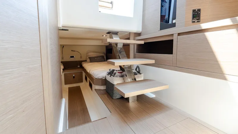  Yacht Photos Pics Interior of 2023 Pardo Yachts P38, featuring modern wooden design and cozy sleeping area.