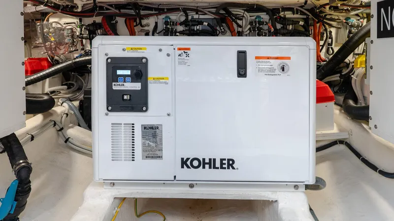  Yacht Photos Pics Engine room of 2023 Pardo Yachts P38 featuring a Kohler generator.