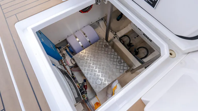  Yacht Photos Pics Engine compartment of 2023 Pardo Yachts P38, featuring Kohler equipment and modern components.