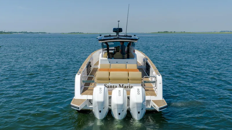  Yacht Photos Pics 2023 Pardo Yachts P38 on water, rear view with triple outboard engines.
