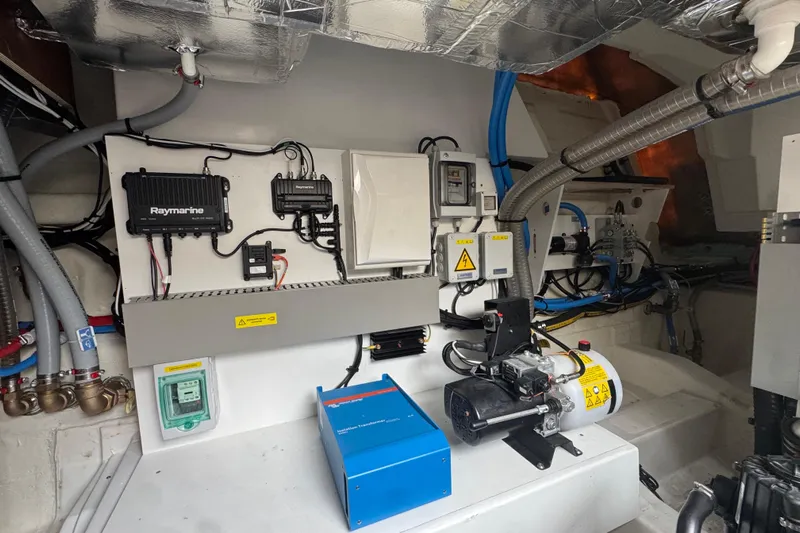 Serenity Yacht Photos Pics Engine room of 2023 Prestige 460S yacht with advanced electrical systems and equipment.