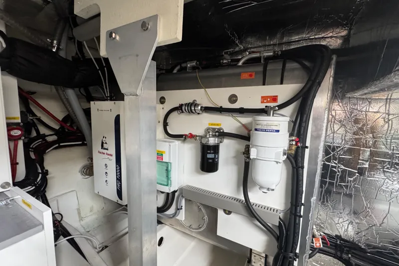 Serenity Yacht Photos Pics Engine room of 2023 Prestige 460S yacht with Fischer Panda generator and Volvo Penta components.