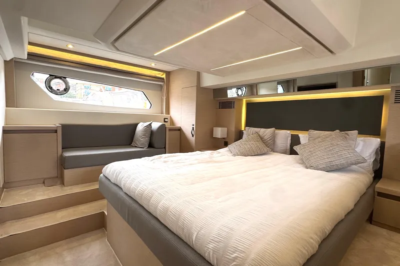 Serenity Yacht Photos Pics Luxurious interior of 2023 Prestige 460S yacht with modern bedroom design.