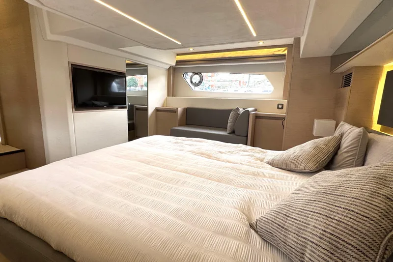 Serenity Yacht Photos Pics Luxurious interior of 2023 Prestige 460S yacht with modern bedroom design.
