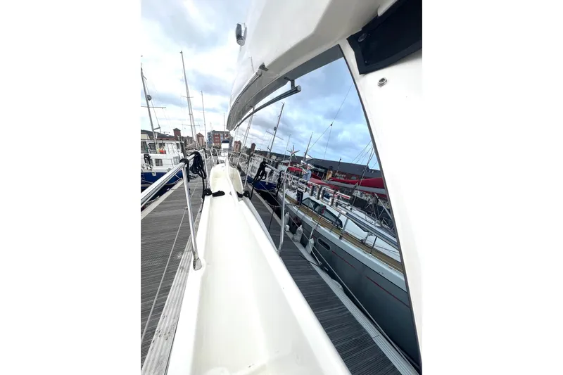 Serenity Yacht Photos Pics Prestige 460S yacht docked at marina, showcasing sleek design and modern features.