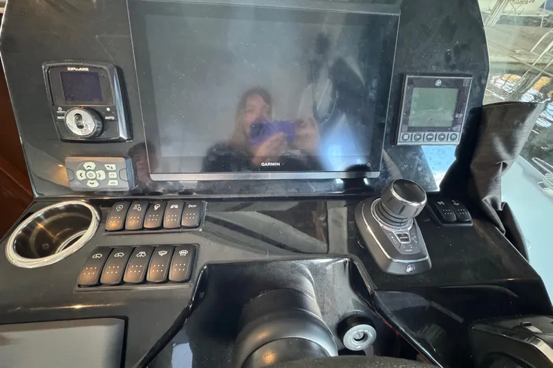  Yacht Photos Pics Control panel of 2025 Beneteau Antares 11 Fly with navigation and joystick controls.