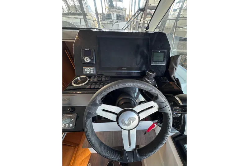  Yacht Photos Pics Steering console of 2025 Beneteau Antares 11 Fly with modern navigation equipment.