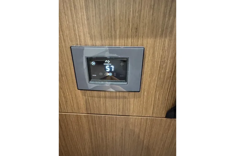  Yacht Photos Pics Digital control panel on 2025 Beneteau Antares 11 Fly yacht interior.