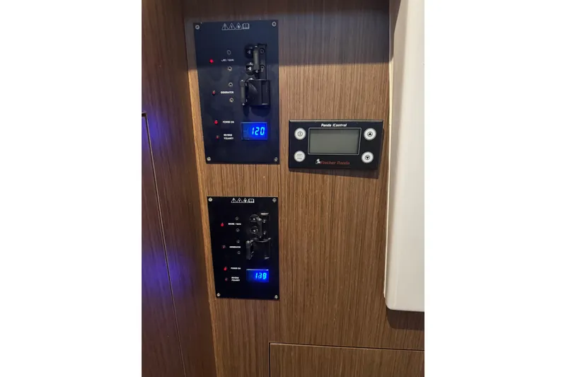  Yacht Photos Pics Control panel on 2025 Beneteau Antares 11 Fly yacht, featuring digital displays and switches.