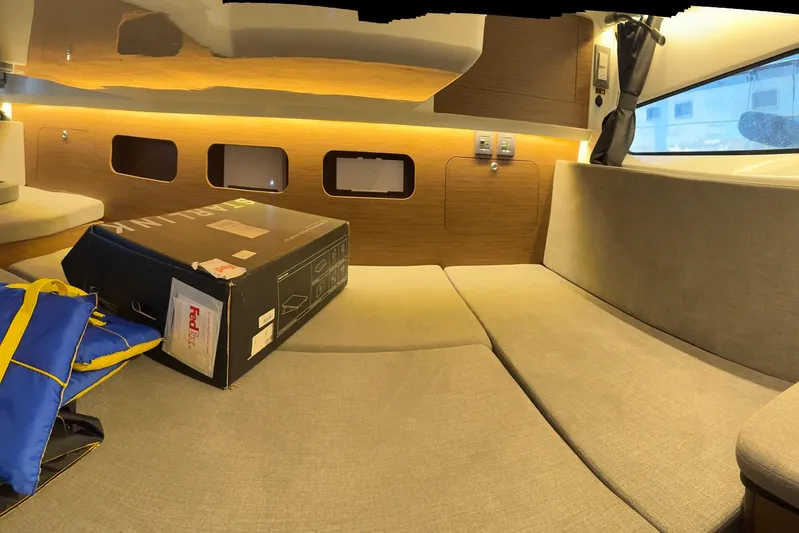  Yacht Photos Pics Interior of 2025 Beneteau Antares 11 Fly with cozy seating and package.