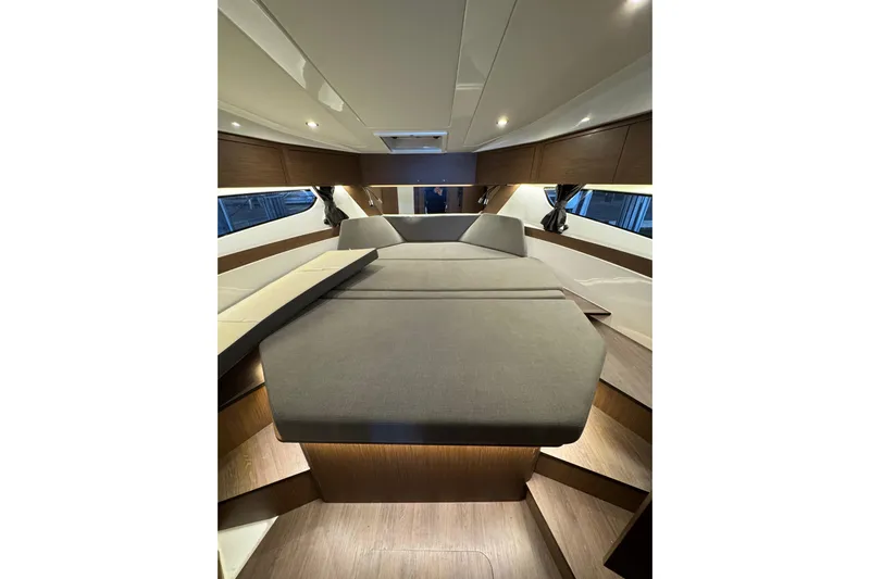  Yacht Photos Pics Luxurious interior of 2025 Beneteau Antares 11 Fly with modern design and cozy seating.