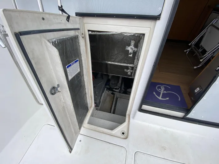  Yacht Photos Pics 2001 Bayliner 3988 engine compartment with open access hatch.